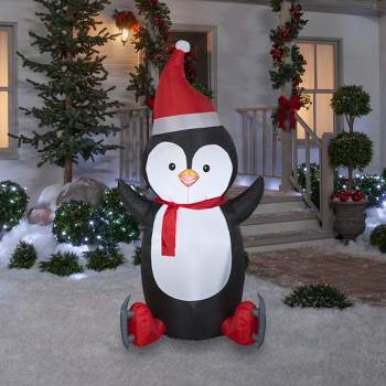Gemmy Christmas Airblown Inflatable Penguin w/Skates OPP, 6.5 ft Tall, Black