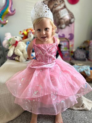 glinda bubble dress GLINDA'S on display at @arlingtonmuseum of art.  The reel I posted of the dress has gotten SO MANY saves, and I'm assuming it's because people want to see Use Glindas glitter infused wand to harness your magic Wicked Deluxe Glinda Pink Bubble