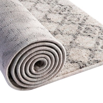 Eco-Friendly Ivory Geometric 4' x 6' Synthetic Area Rug
