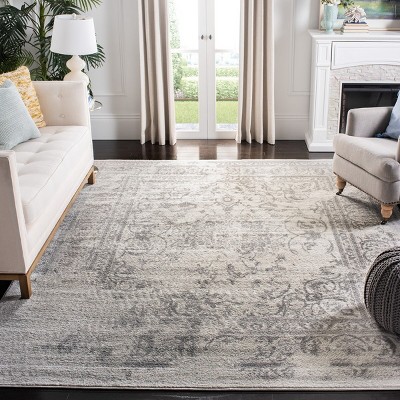 Ivory and Silver Synthetic 8' x 10' Easy-Care Rectangular Rug