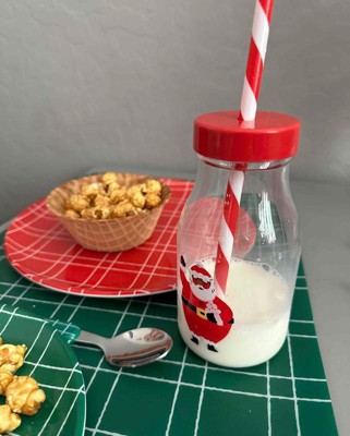 Christmas Milk For Santa In Bottle With Straw And Peppermint Candy