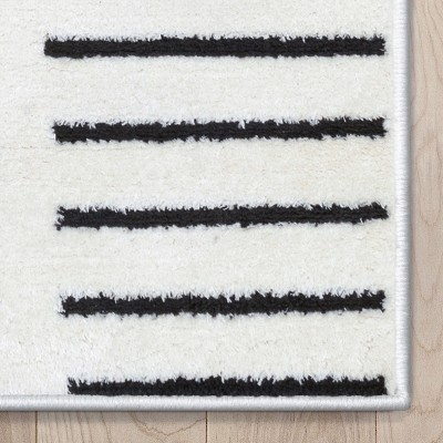 Ivory Black Geometric Shag Synthetic Area Rug 5'3" x 7'