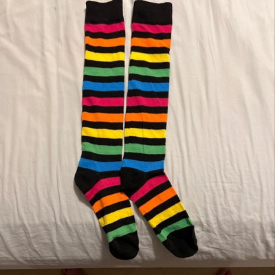 Tall over-the-knee rainbow socks for women have stripes in every color and  are the perfect way to brighten up you…