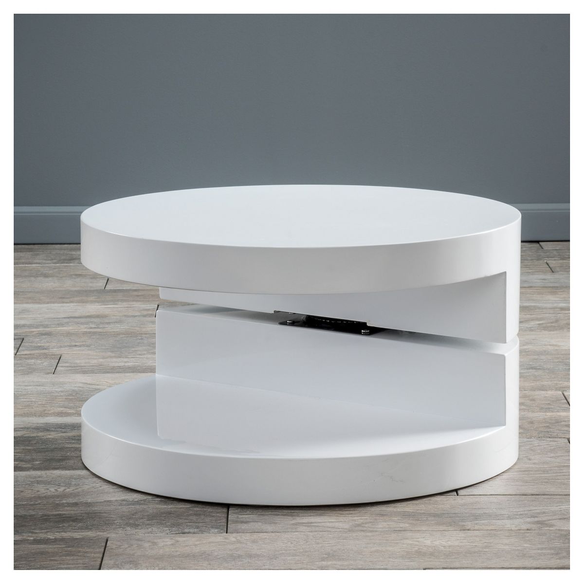 Front view of rotating white oval coffee table