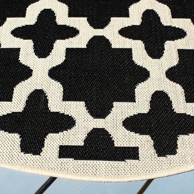 Courtyard Reversible 47" Round Black & Beige Synthetic Area Rug