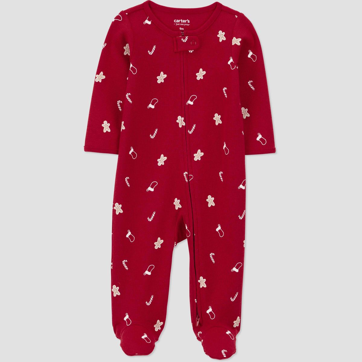 A red jumpsuit with white holiday graphics