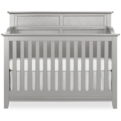 silver metal crib