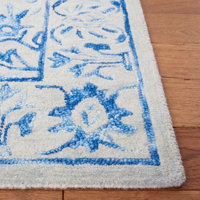 Hand-Tufted Blue and Beige Wool 4' x 6' Area Rug