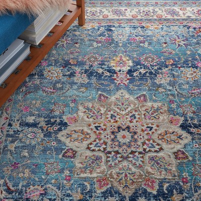 Vintage Blue and Ivory Synthetic 4' x 6' Area Rug