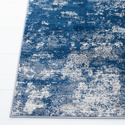 Grey and Navy Abstract 8' x 10' Synthetic Area Rug