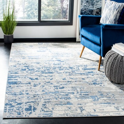 Abstract Ivory/Blue Synthetic 4' x 6' Hand-Knotted Area Rug