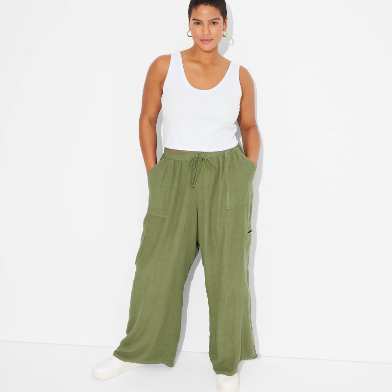 Women's Mid-Rise Wide Leg Vacation Cargo Pants - Wild Fable™, 1 of 6
