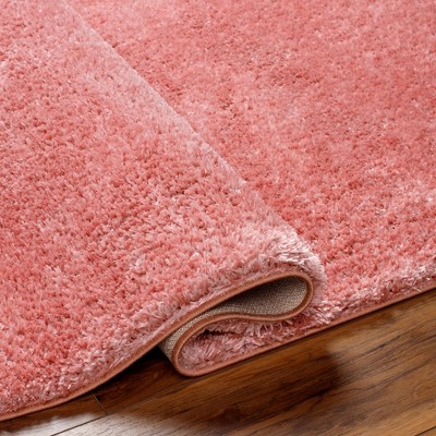 Coral Pink Tufted Washable Synthetic Area Rug 5'3" x 7'