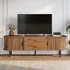 LOVSON  70.87" Walnut Mid-Century Modern Fluted TV Stand with Tambour Sliding Doors for Living Room - 2 of 4