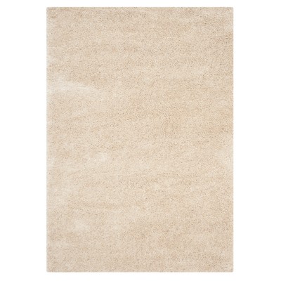 Ivory Solid Shag/Flokati Loomed Area Rug 5'1"x7'6" - Safavieh