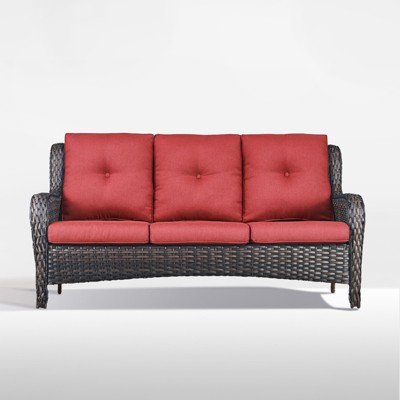 brown wicker/red cushion