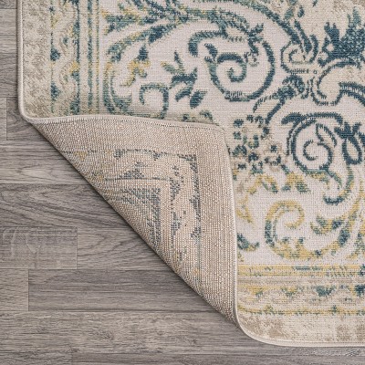 Ivory/Navy 4' x 6' Reversible Synthetic Medallion Rug