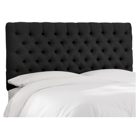 black tufted headboard with crystals