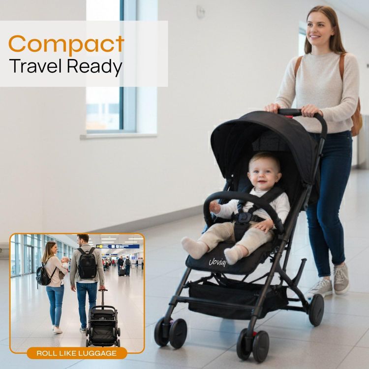 A black colored stroller with a canopy and a baby seated inside, being pushed by a person in a hallway, with text reading "Compact Travel Ready" and an inset image showing the stroller being rolled like luggage.