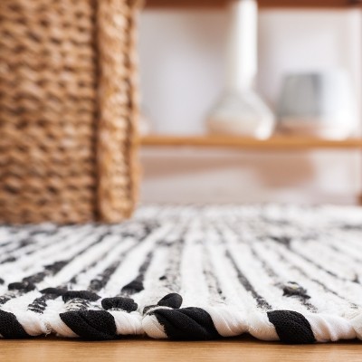 Boho Chic Black and Ivory Striped Kilim 5' x 8' Wool Area Rug
