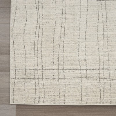 Ivory and Grey Abstract 4' x 6' Synthetic Area Rug