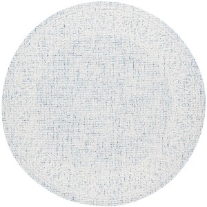 Ebony EBN277 Hand Tufted Indoor Rugs - Safavieh - 1 of 3