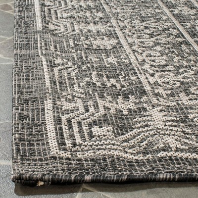 Safavieh Courtyard Black and Beige Rectangular Synthetic Rug