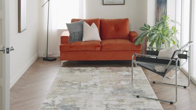 Ivory Abstract 6' x 9' Synthetic Area Rug