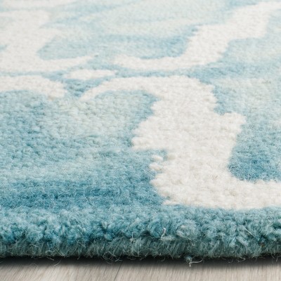 Ivory and Turquoise Hand-Tufted Wool Area Rug