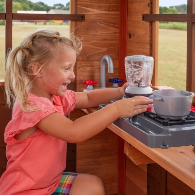 Echo Heights Elevated Cedar Playhouse with Slide and Kitchen