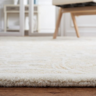 Ivory Hand-Tufted Wool 4' x 6' Area Rug