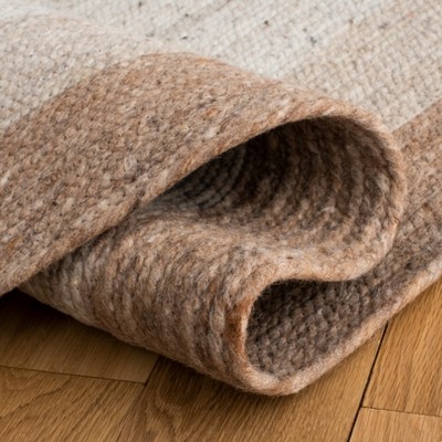 Handwoven Beige & Ivory Braided Wool 7' Round Area Rug