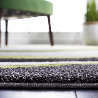Grey and Green Abstract Synthetic 8' x 10' Area Rug