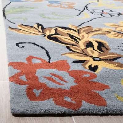 Handmade Tufted Blue and Multicolor Wool Area Rug