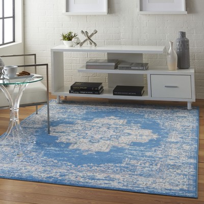 Elegant Medallion Tufted Round Blue 5'3" x 7'3" Synthetic Rug
