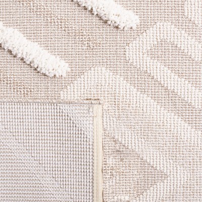 Ivory and Beige Geometric Synthetic 8' x 10' Area Rug