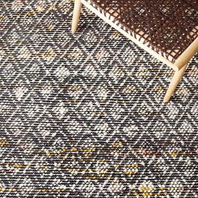Ivory and Black Handwoven Wool Area Rug, 5' x 8'