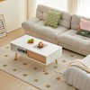 White 41.34" Rattan Coffee Table with Sliding Door Storage and Solid Wood Legs for Modern Living Room - 2 of 4