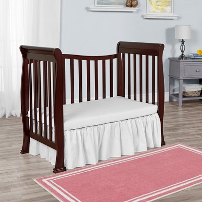 Espresso Pine 4-in-1 Convertible Mini Crib with Adjustable Mattress