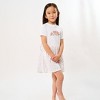 The Juniper Shop Lil Sister Stacked Curved Toddler Graphic Dress - 2 of 3