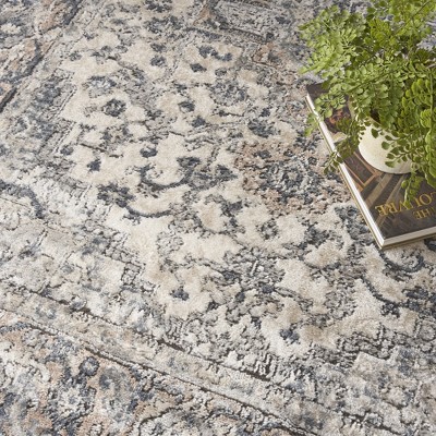 Ivory and Grey Synthetic 5' x 7' Reversible Area Rug