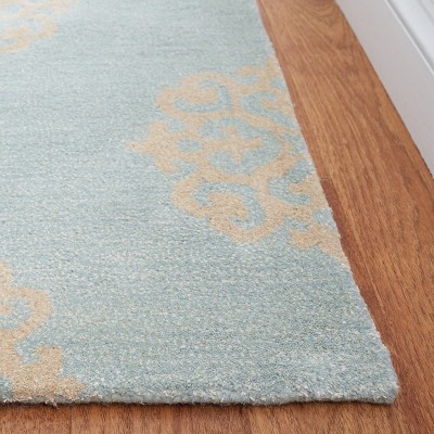Handmade Turquoise and Yellow Wool Viscose 6' x 9' Area Rug