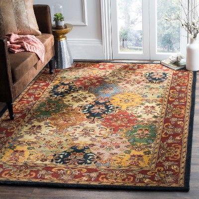 Handmade Multi/Burgundy Tufted Wool Oval 6' x 9' Area Rug
