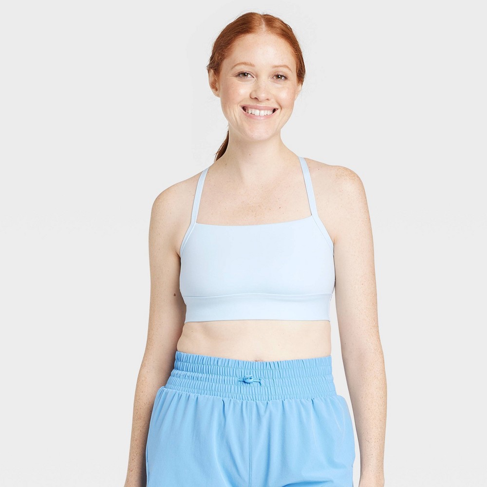 size medium, Women's Light Support Brushed Sculpt Halter Midline Sports Bra - All in Motion Light Blue M