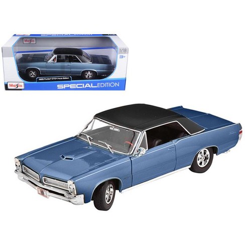 1965 Pontiac Gto Hurst Blue With Black Top 1 18 Diecast Model Car By Maisto Target