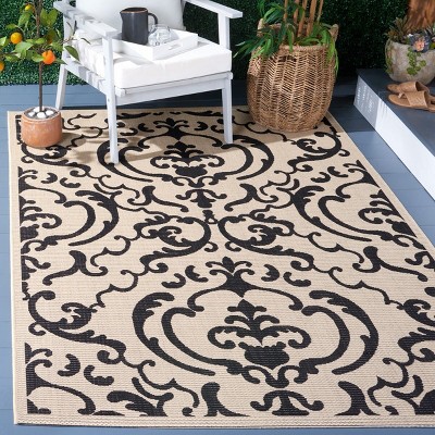 Black and Sand Synthetic Stain-Resistant Indoor/Outdoor Rug