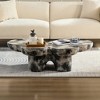 Faux Travertine Butterfly-Shaped Modern Coffee Table with Fiberglass Base and Artistic Design - 4 of 4
