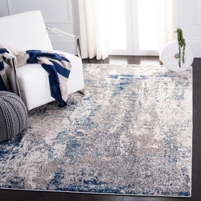 4' x 6' Gray and Navy Abstract Synthetic Area Rug