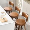 Bekrvio 26" Swivel Counter Height Bar Stools, Faux Leather Upholstered with Back, Walnut Wood Legs, Mid Century Kitchen Island Counter Chairs - 2 of 4