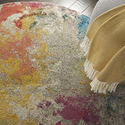 Ivory and Multicolor Abstract Tufted Synthetic Area Rug